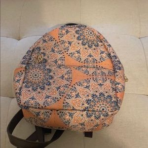 Peach and navy blue make up backpack